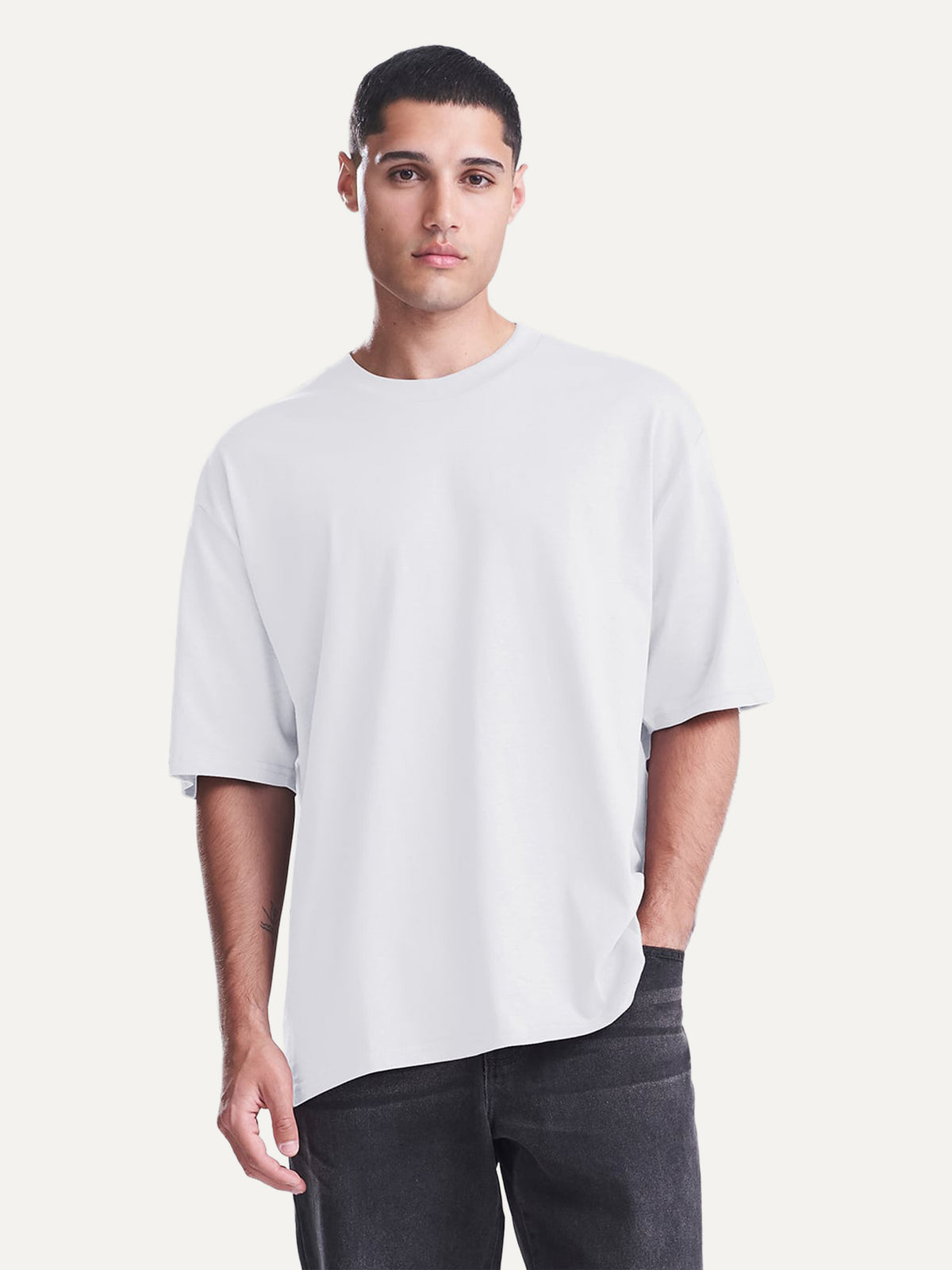 Essential Tee in Arctic White, worn by a model
