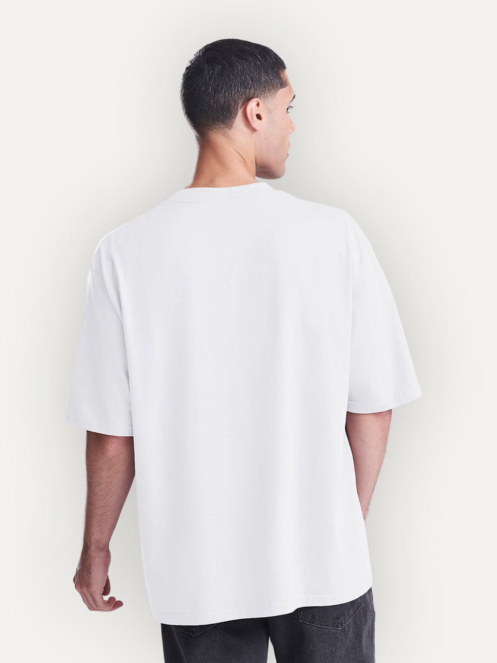 Essential Tee in Arctic White, worn by a model, back view