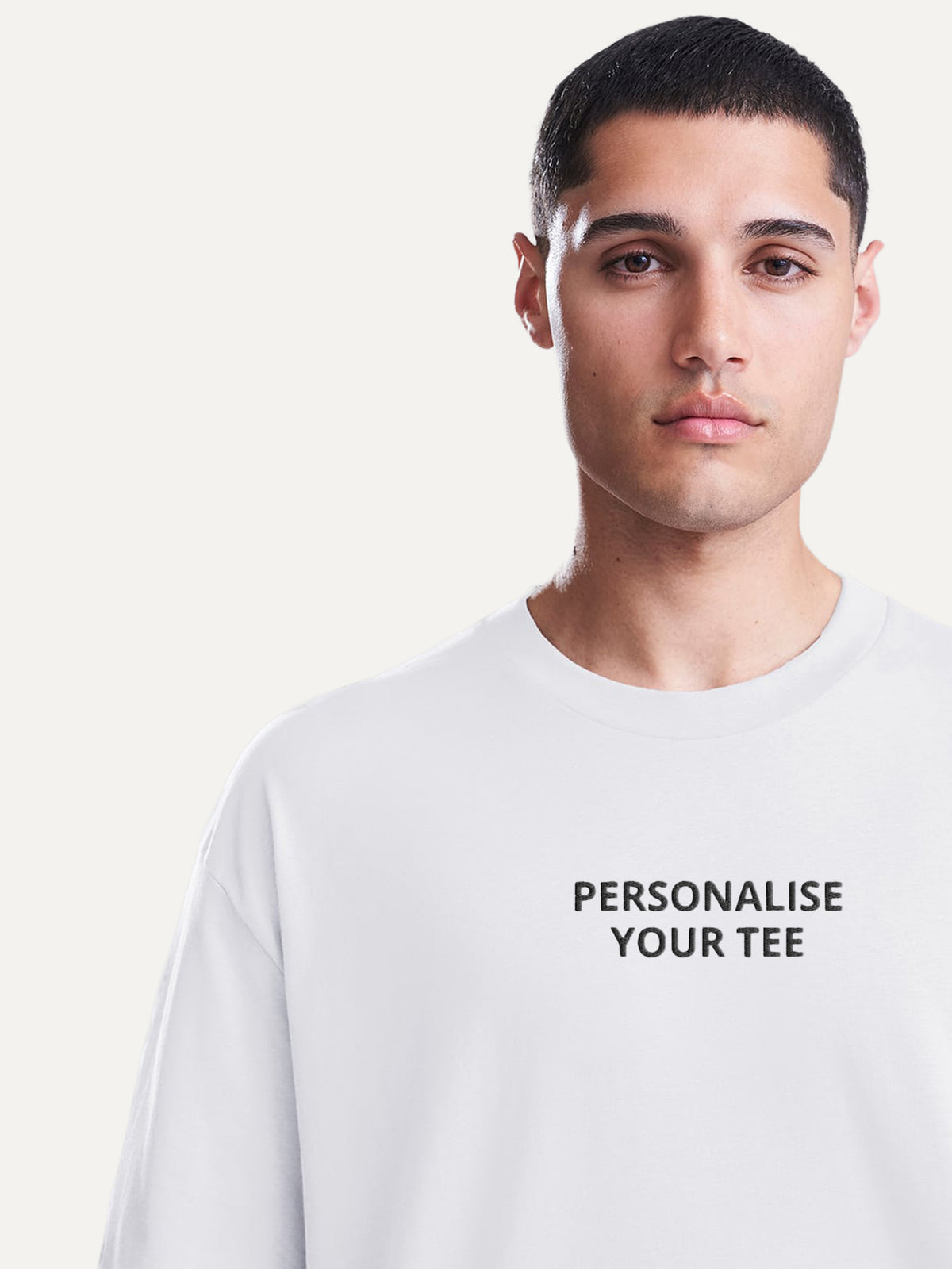 Close-up of the Custom Text Tee neckline in Arctic White